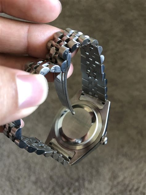 how to open rolex band.